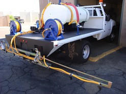 300 Gallon Weed Spray flatbed with folding boom